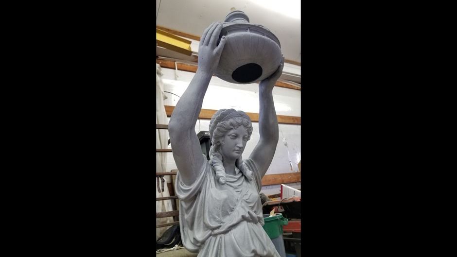 Various photos of the restoration of the fountain