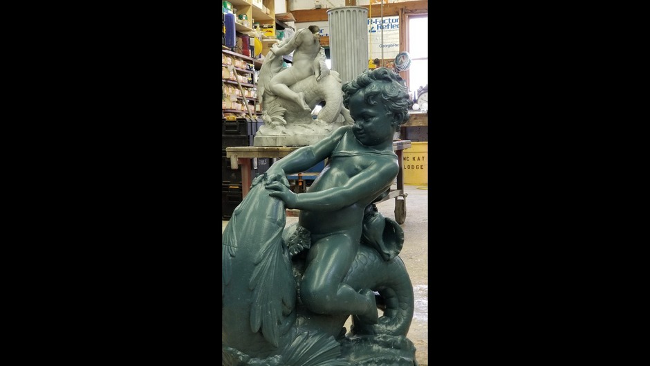 Various photos of the restoration of the fountain