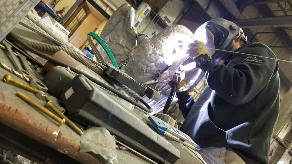 Various photos of the restoration of the fountain