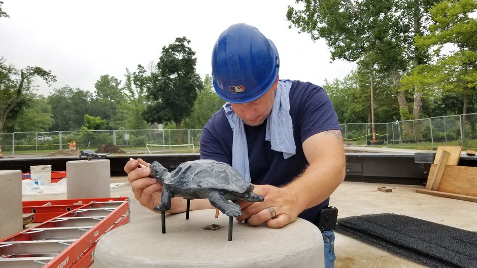 Various photos of the restoration of the fountain