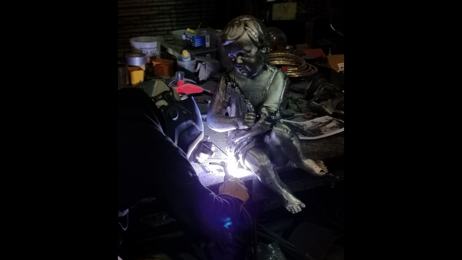 Various photos of the restoration of the fountain