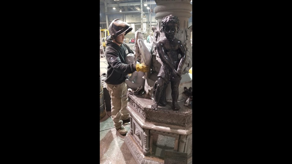 Various photos of the restoration of the fountain