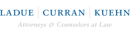 LADUE, CURRAN & KUEHN Logo